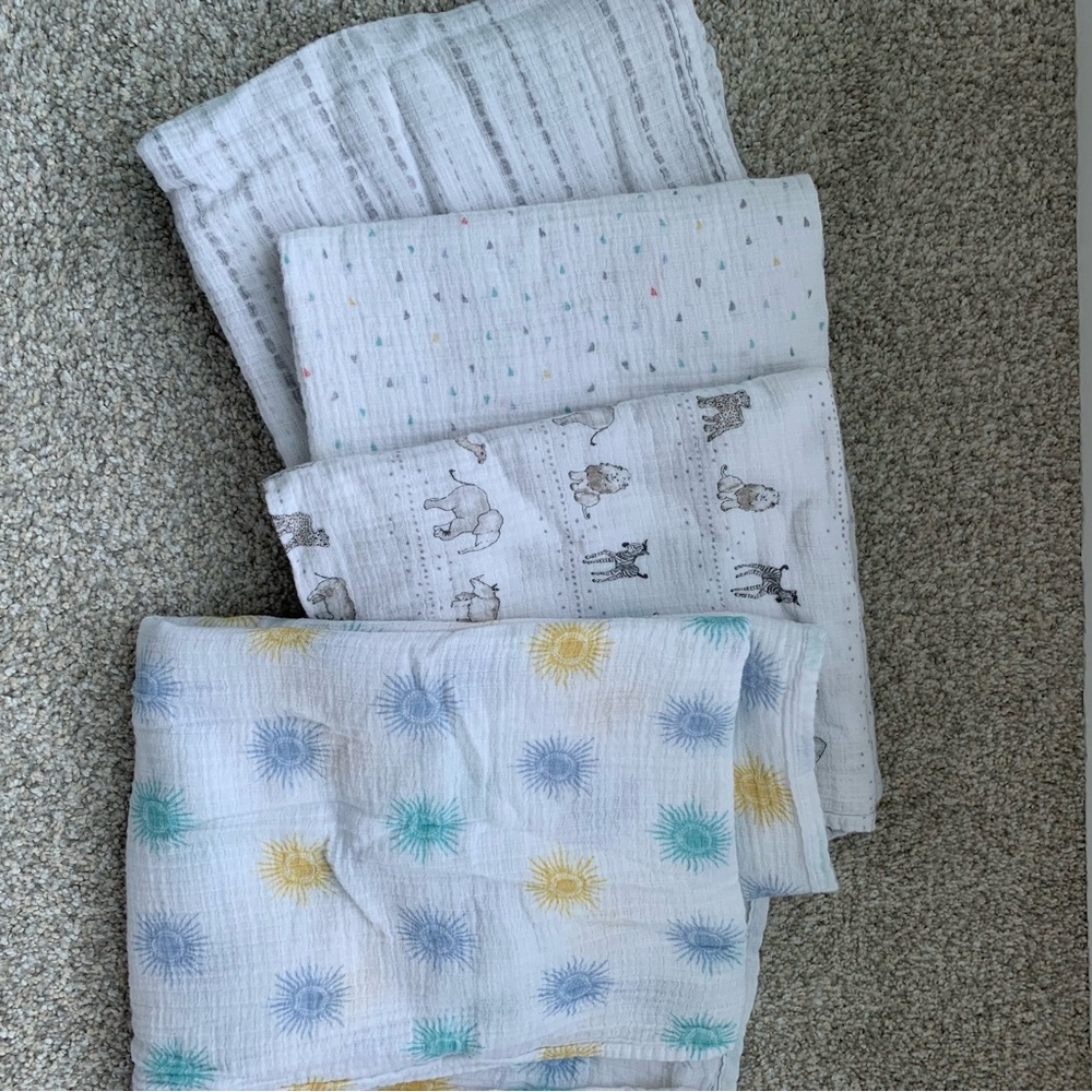 Gently used Aden + Anais muslin swaddle blankets. Bundle of 4.